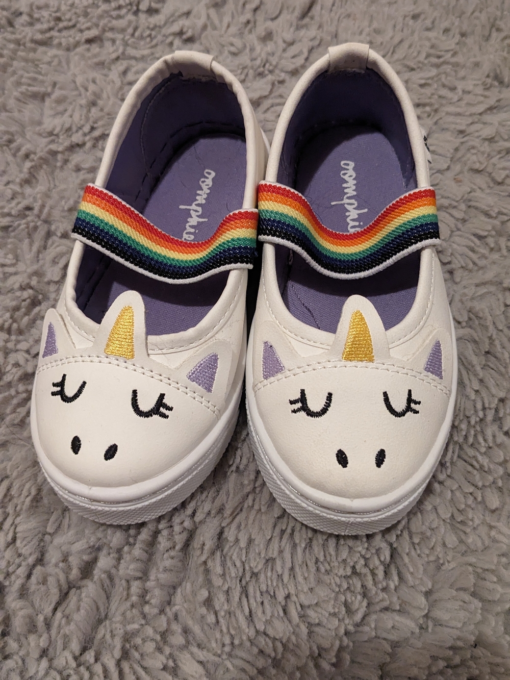 oomphies White Unicorn Slip-Ons with Rainbow Elastic Strap